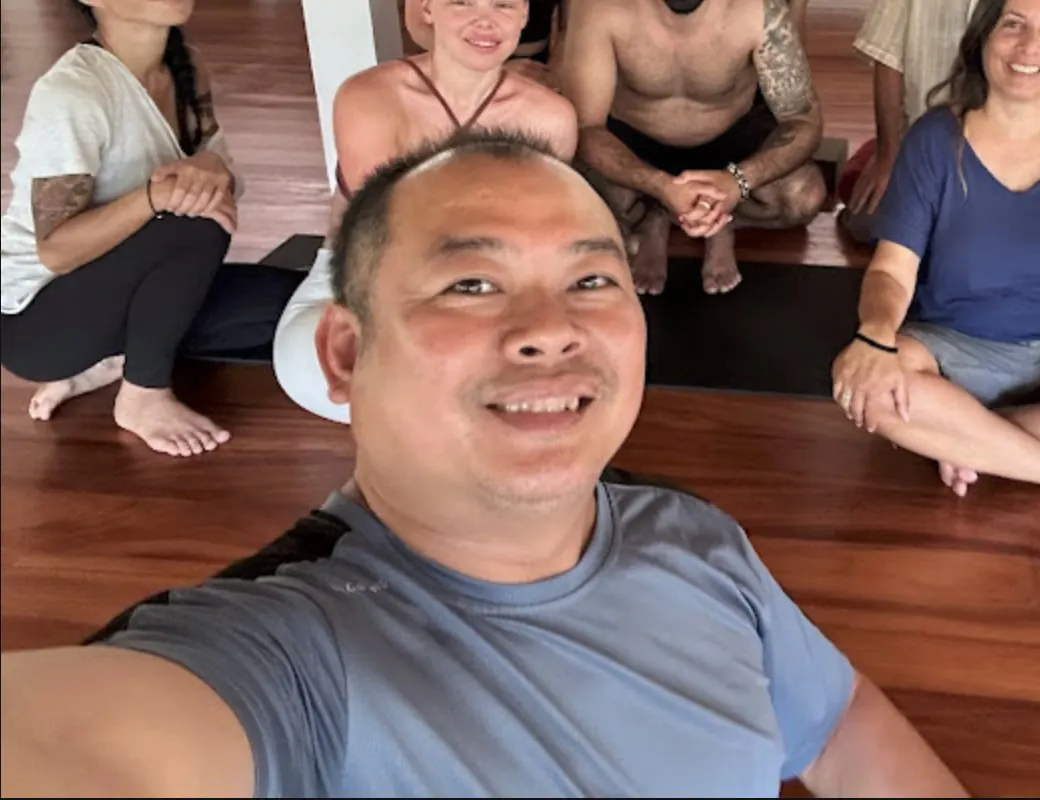 Vuth, massage therapist in Koh Phangan, with a group after a self-care session